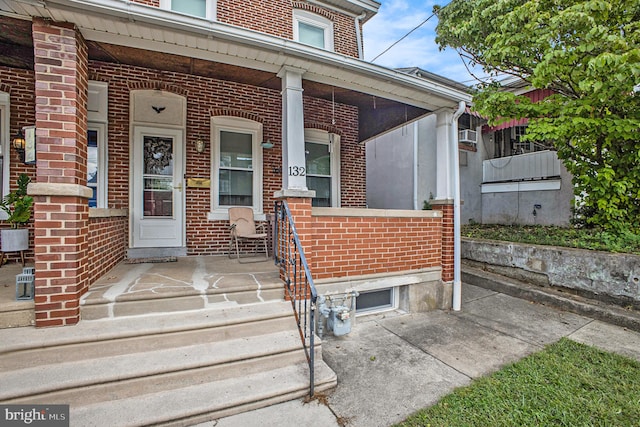 entrance to property with a porch