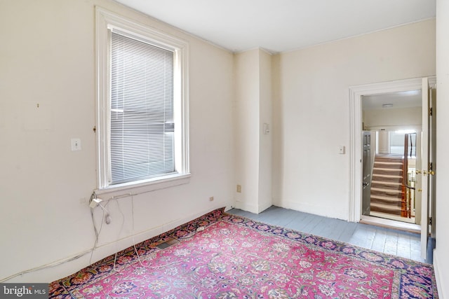 unfurnished room featuring light hardwood / wood-style flooring