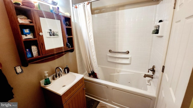 bathroom with shower / bath combination with curtain and vanity