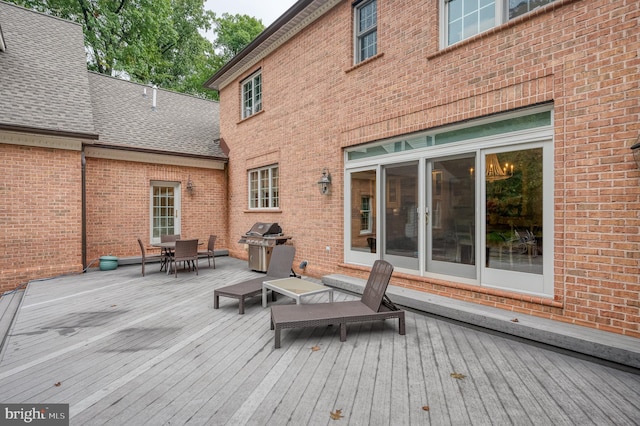 wooden terrace with grilling area