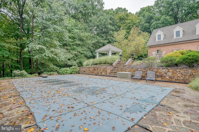 view of patio / terrace featuring a gazebo