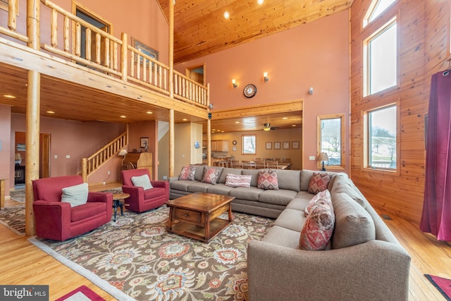 79 Cedar Shores Dr, Mc Henry, MD 21541 - living area with a towering ceiling, wood finished floors, stairway, and wooden ceiling