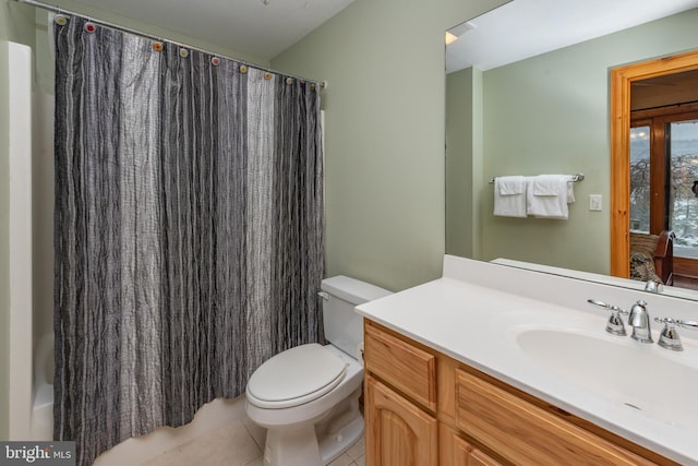 full bathroom featuring shower / bathtub combination with curtain, tile patterned flooring, vanity, and toilet