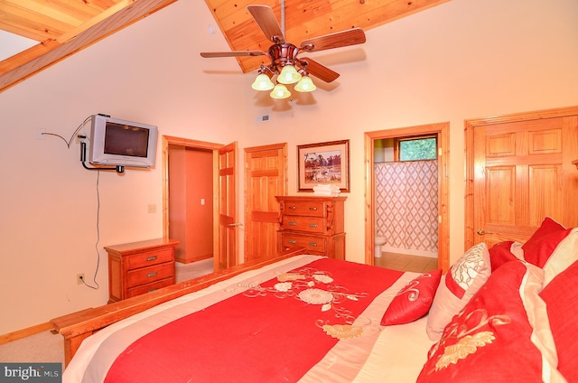 bedroom with ceiling fan, ensuite bathroom, high vaulted ceiling, and wooden ceiling