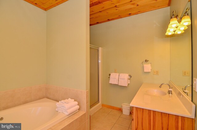 79 Cedar Shores Dr, Mc Henry, MD 21541 - bathroom with a garden tub, a stall shower, tile patterned flooring, and vanity