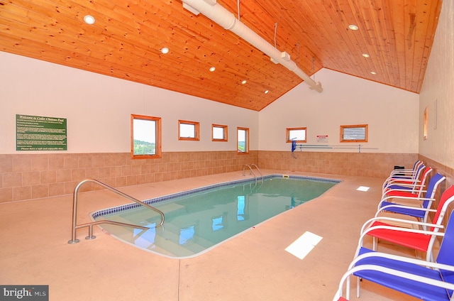 view of pool with a jacuzzi