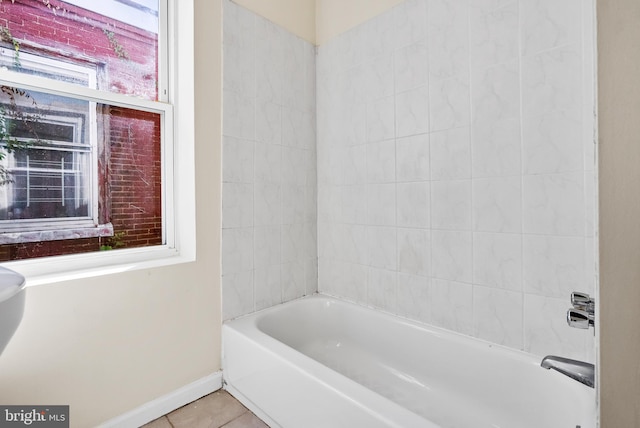 bathroom with tile patterned flooring