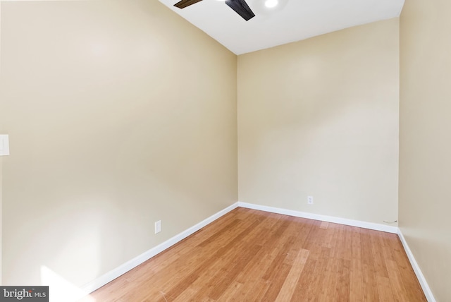 unfurnished room with wood-type flooring and ceiling fan