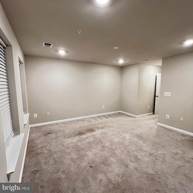 basement with carpet flooring