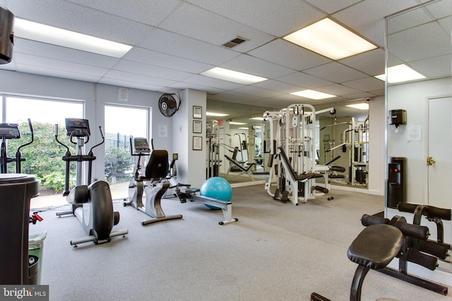 gym featuring a drop ceiling