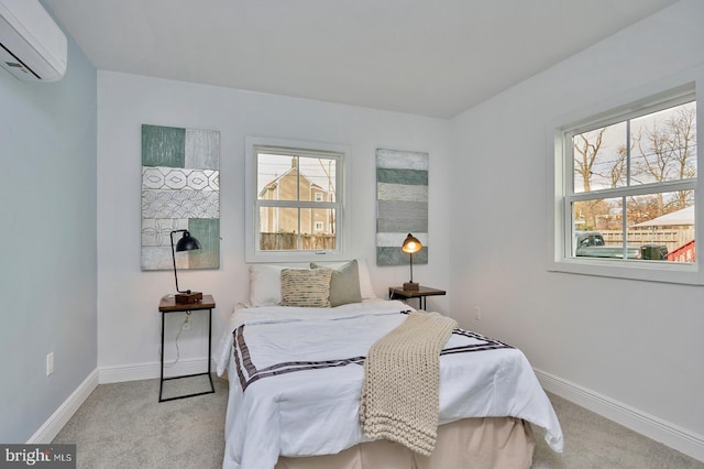 carpeted bedroom with multiple windows and a wall unit AC