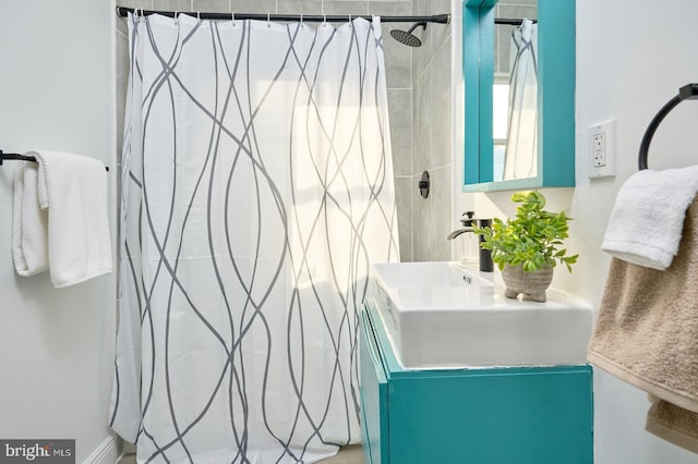 bathroom featuring a shower with curtain