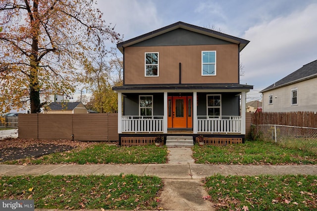 view of property with a porch