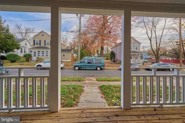 view of yard with covered porch