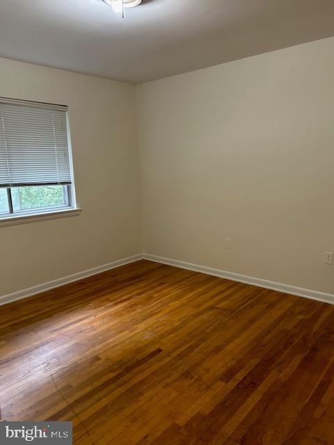 empty room featuring hardwood / wood-style floors