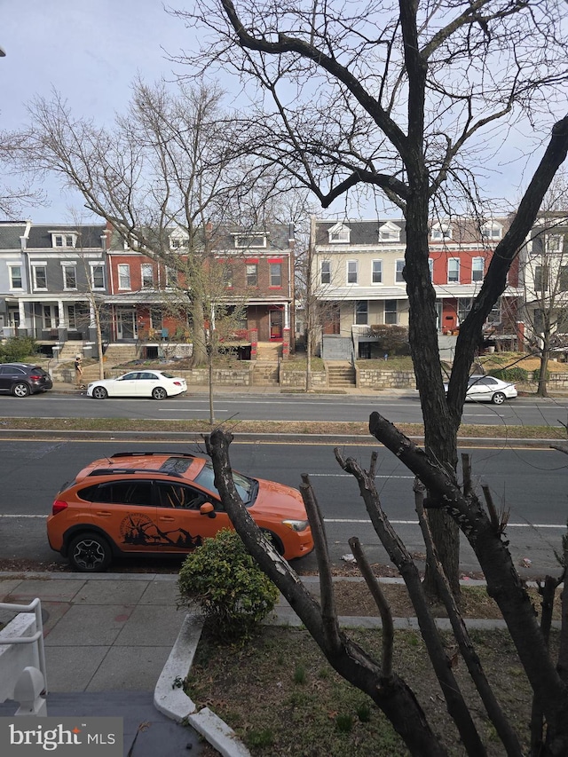 4124 New Hampshire Ave NW, Washington, DC 20011 - view of asphalt street with curbs, sidewalks, and a residential view