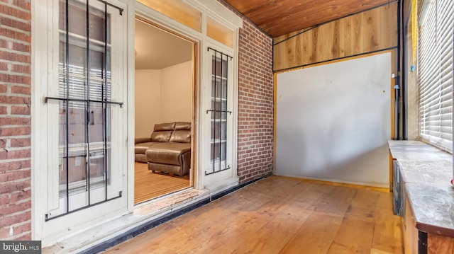 exterior space featuring wood ceiling