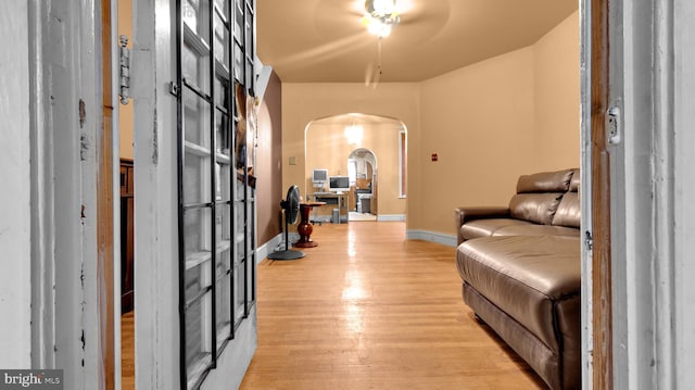 entrance foyer with ceiling fan and light hardwood / wood-style floors