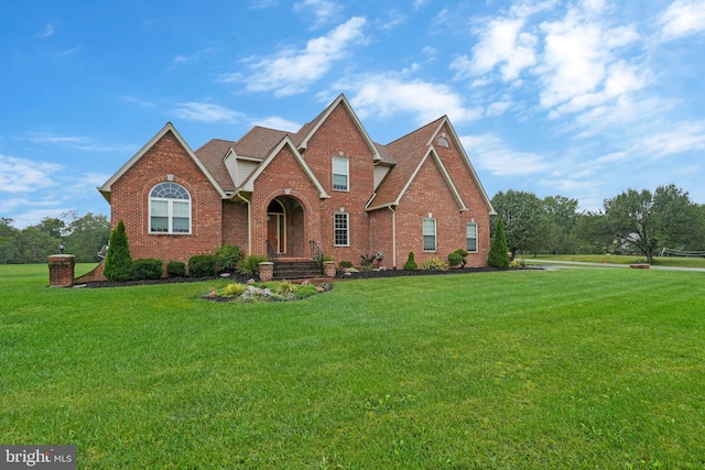 view of property featuring a front yard