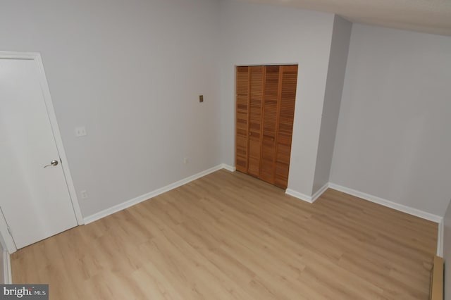 spare room with light wood-type flooring