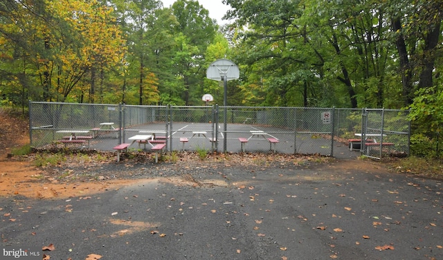 view of property's community with basketball court