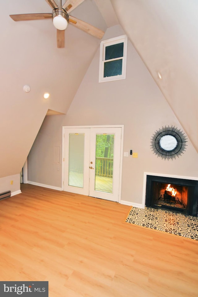 bonus room featuring ceiling fan, lofted ceiling, and hardwood / wood-style floors