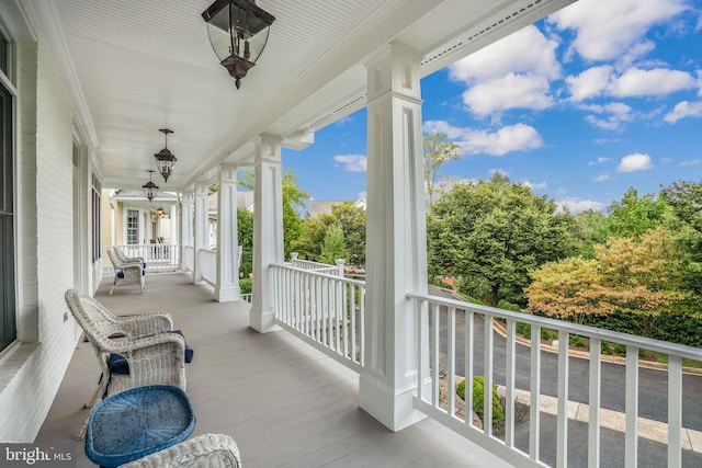 balcony featuring covered porch