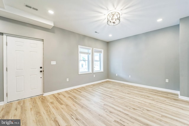 entrance foyer with light hardwood / wood-style flooring