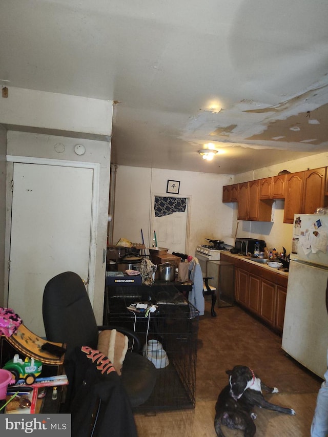 kitchen featuring white refrigerator