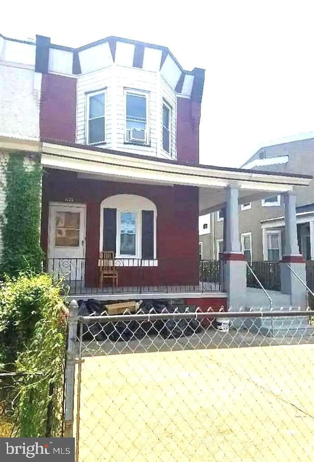 view of front of home featuring covered porch