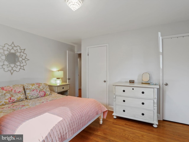 bedroom featuring hardwood / wood-style flooring