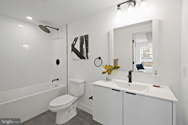 full bathroom featuring tile patterned flooring, tiled shower / bath combo, vanity, and toilet