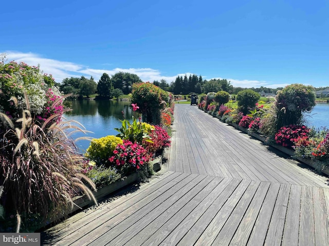 deck featuring a water view