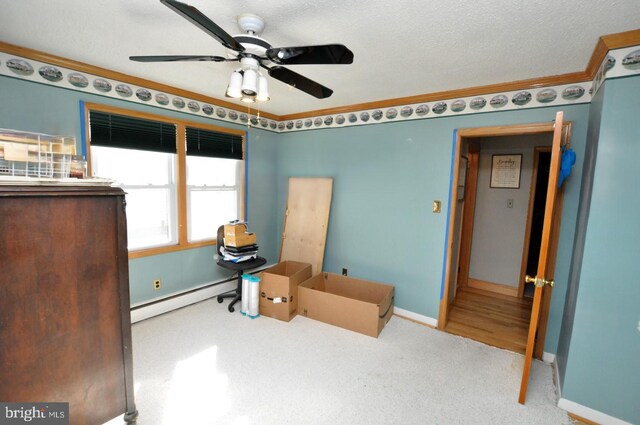 miscellaneous room with ceiling fan, a textured ceiling, carpet floors, ornamental molding, and baseboard heating