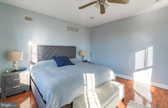 bedroom featuring ceiling fan and hardwood / wood-style flooring