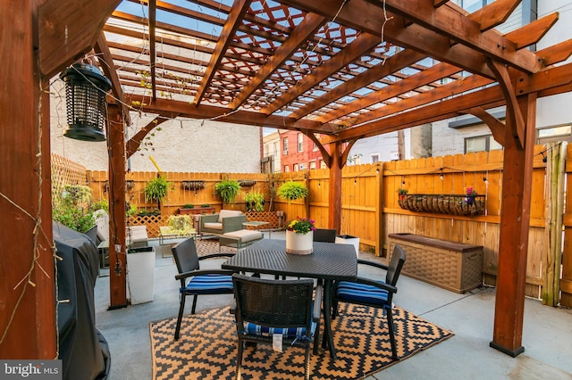 view of patio / terrace with a pergola and an outdoor living space