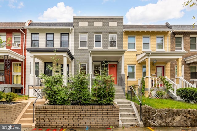 multi unit property featuring a porch