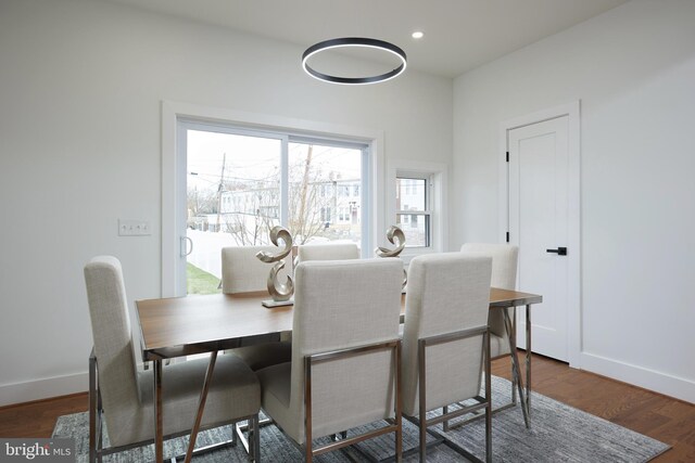 dining area featuring dark hardwood / wood-style flooring