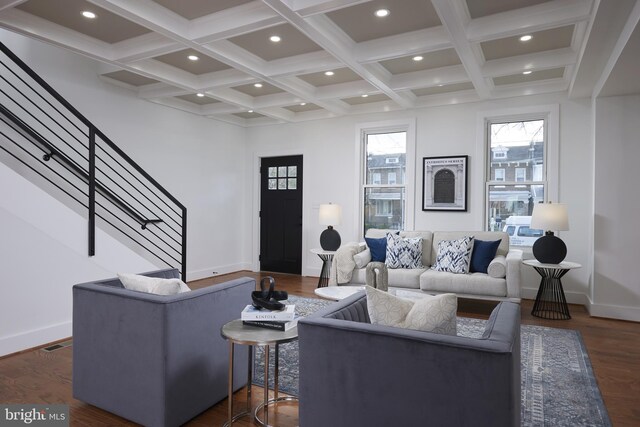 living room featuring beamed ceiling, dark hardwood / wood-style floors, and coffered ceiling