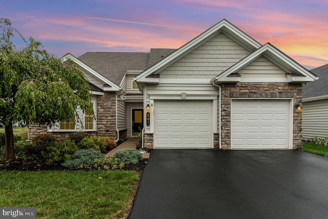 view of front of home with a garage