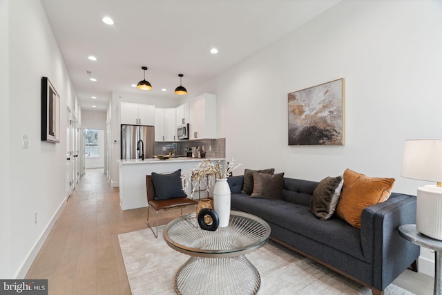 living room featuring light wood-type flooring