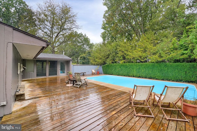 view of pool with a deck