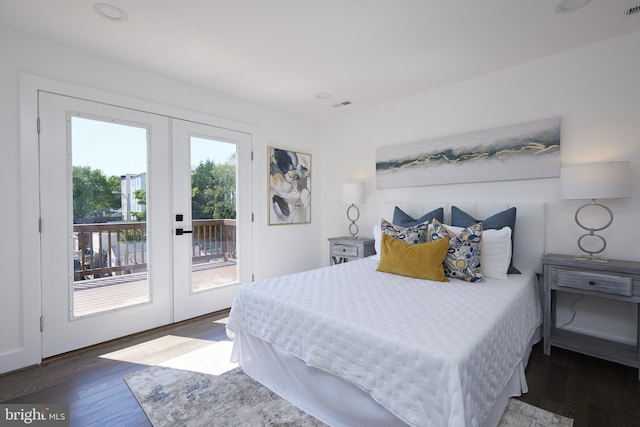 bedroom with dark hardwood / wood-style floors, access to exterior, and french doors