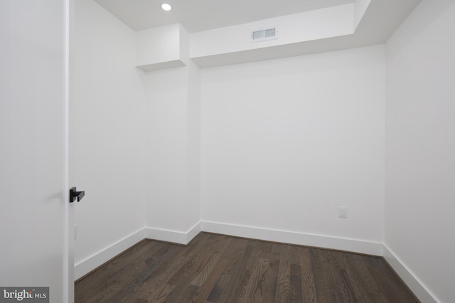 interior space with dark hardwood / wood-style flooring