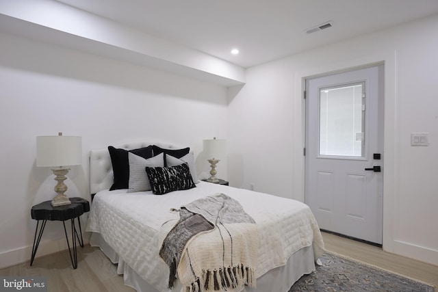 bedroom featuring light hardwood / wood-style floors