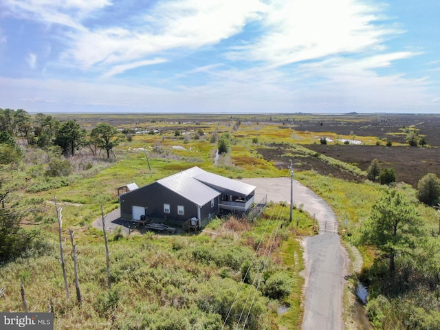 birds eye view of property featuring a rural view