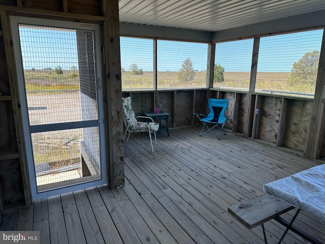 sunroom / solarium with a wealth of natural light