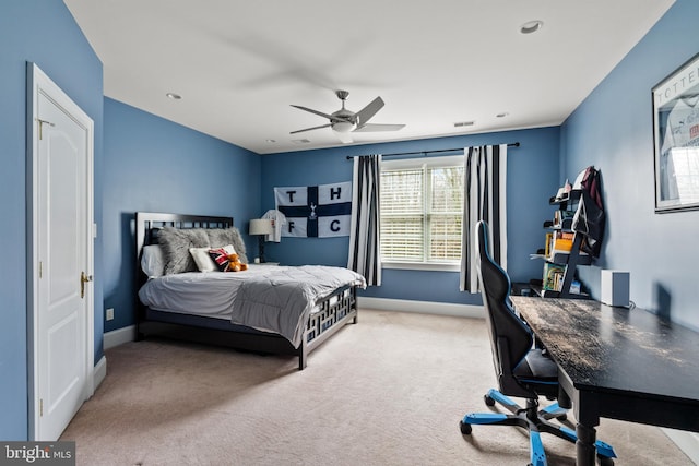 bedroom with ceiling fan and carpet