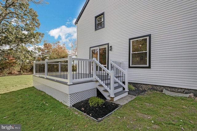 exterior space with a lawn and a deck