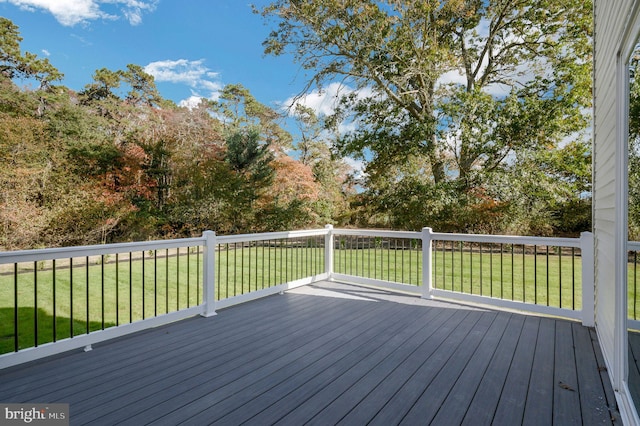 deck featuring a yard